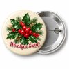Przypinka Wesołych Świąt Ostrokrzew: przypinka na Boże Narodzenie z napisem Wesołych Świąt – przód i aluminiowy tył z agrafką